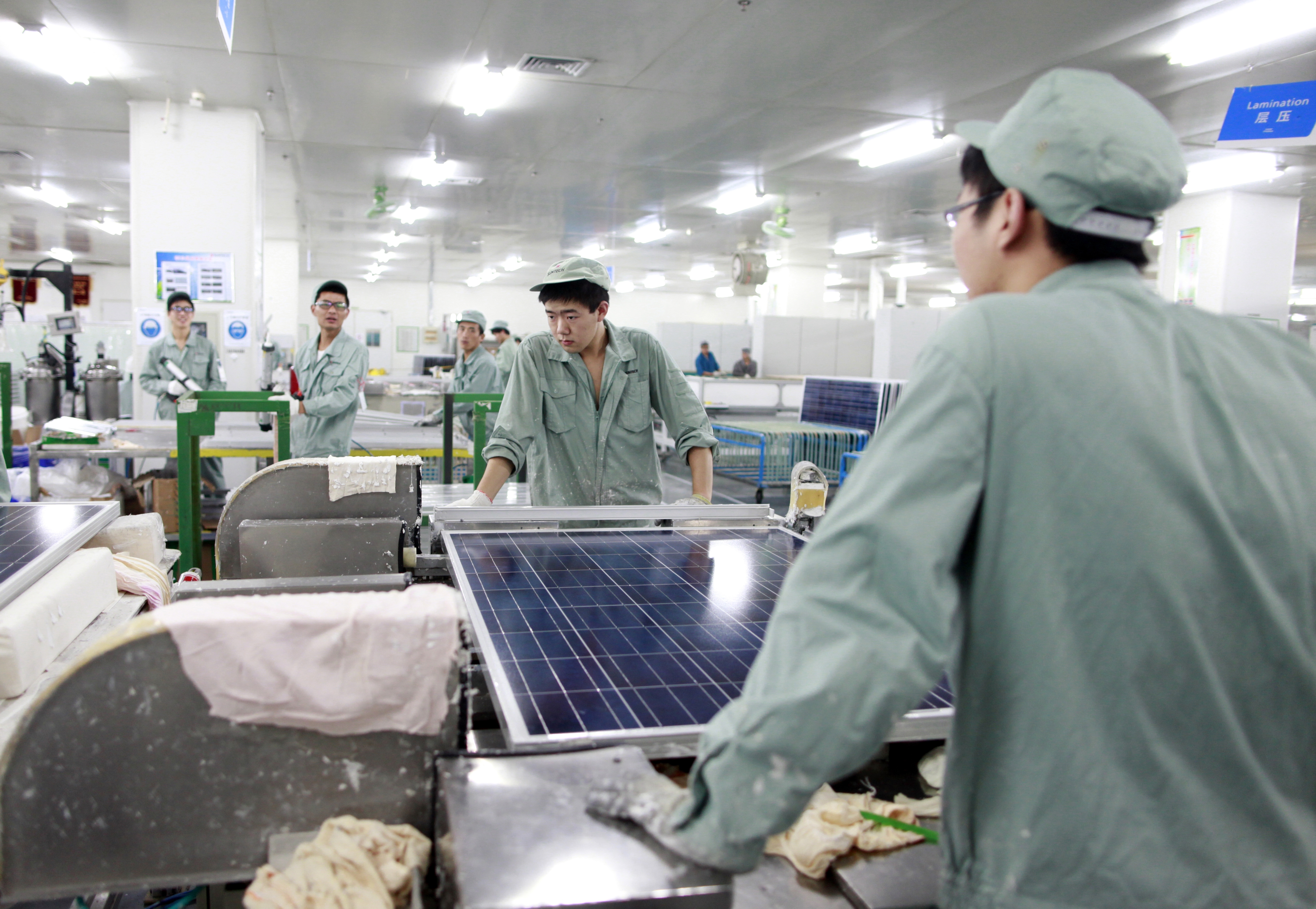 Chinese Solar Cell Panel Factory Worker