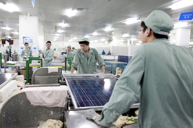 Chinese Solar Cell Panel Factory Worker