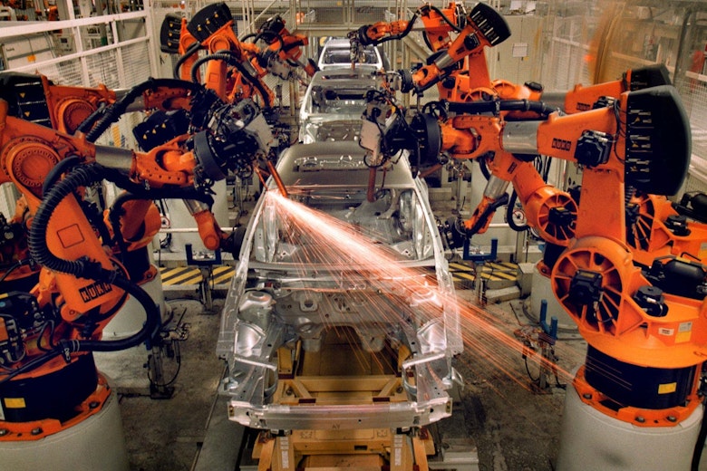 Robot Arms At Car Factory